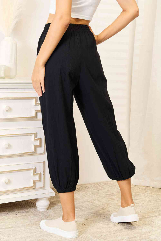Full Size Decorative Button Cropped Pants